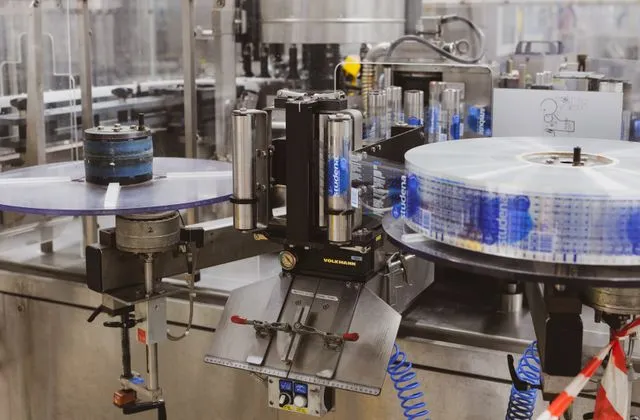 Quality control worker in a factory laboratory Quality control worker in a factory laboratory